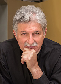 headshot photo of Ed Mazria