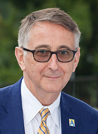 headshot photo of John C. Chadwick