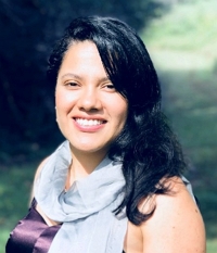 headshot photo of Luz Toro