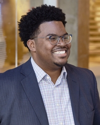 headshot photo of Reginald Truxon