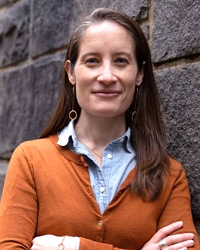 headshot photo of Melanie De Cola