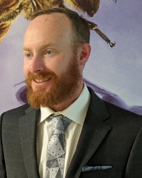 headshot photo of Sam Petty
