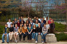 Photo of The Ohio State University team members standing in front of a building.