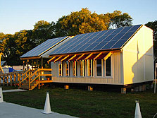 Photo of the 2002 Tuskegee University house with the windows open.