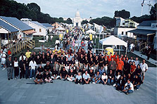 Photo of large group of students who competed in Solar Decathlon with competition organizers.